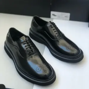 Black leather derby shoes, sole and welt