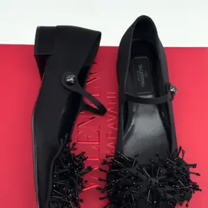Black Mary Jane flats, beaded toe detail