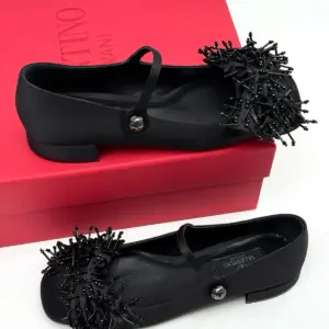Black Mary Jane flats, studio view