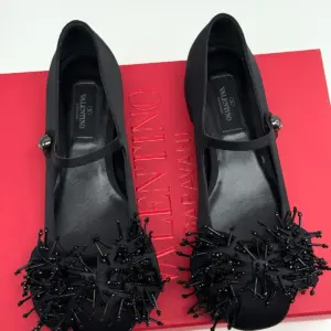 Black Mary Jane flats, top view