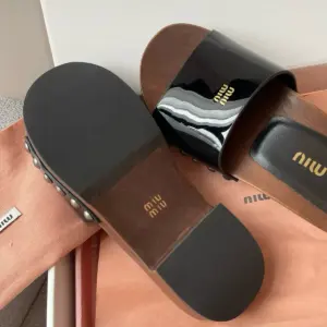 Brown patent leather slippers, view 3