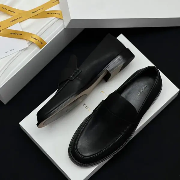 Retro black leather loafers, view 1